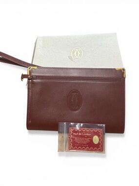 1995 Pristine Cartier Must Line Bordeaux Leather Wristlet Clutch w/ Gold Corners